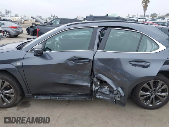2023 Lexus UX 250h F Sport z VIN JTHB6JBH9P2132431, wystawiony jako IAAI lot #42137625 z przebiegiem 15 923 mil mil oraz . Historia ofert i sprzedaży dostępna na DreamBid. Obrazek 14.