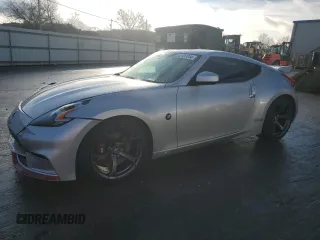 2009 Nissan 370Z Touring with VIN JN1AZ44E29M400786, listed as a Copart auction lot 82497044 with 101,610 mi miles and Salvage Title. Bid and sale history available at carsss.com. Image 1.
