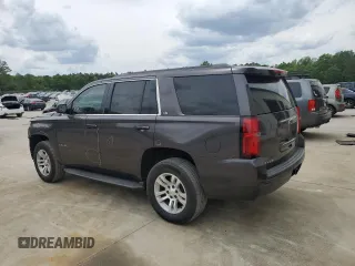 2015 Chevrolet Tahoe LS with VIN 1GNSCAKC8FR243239, listed as a Copart auction lot 53604445 with 155,881 mi miles and Salvage title. Bid and sale history available at DreamBid. Image 2.