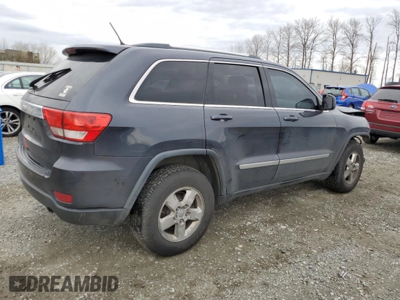 2013 Jeep Grand Cherokee Laredo with VIN 1C4RJFAG6DC630354, listed as a Copart auction lot 49773425 with 113,291 mi miles and Salvage Title. Bid and sale history available at carsss.com. Image 3.