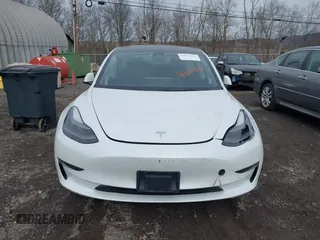 2023 Tesla Model 3 Long Range with VIN 5YJ3E1EB8PF600291, listed as a IAAI auction lot 41651156 with 37,055 mi miles and . Bid and sale history available at DreamBid. Image 11.