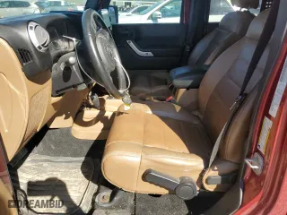 2011 Jeep Wrangler Unlimited Sahara with VIN 1J4BA5H14BL524912, listed as a Copart auction lot 46039935 with 152,782 mi miles and Salvage Title. Bid and sale history available at carsss.com. Image 7.