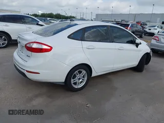 2017 Ford Fiesta SE z VIN 3FADP4BJ1HM126375, wystawiony jako IAAI lot #42244318 z przebiegiem 70 829 mil mil oraz . Historia ofert i sprzedaży dostępna na DreamBid. Obrazek 4.
