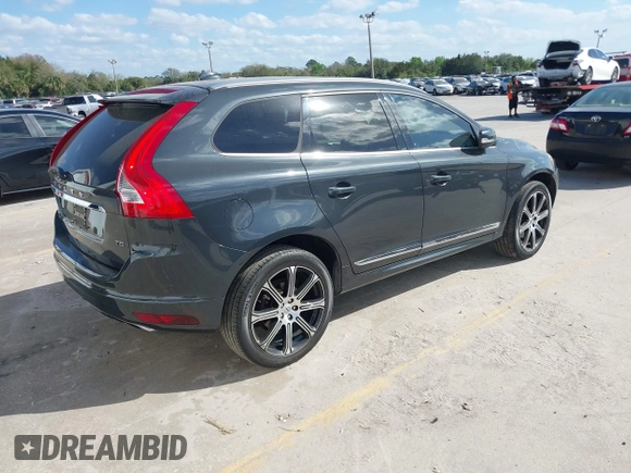 2015 Volvo XC60 T5 Drive-E Premier Plus with VIN YV440MDC7F2606774, listed as a IAAI auction lot 41564034 with 166,758 mi miles. Bid and sale history available at carsss.com. Image 4.