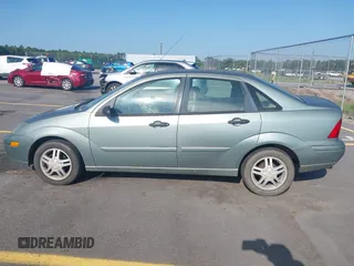 2003 Ford Focus SE with VIN 1FAFP34P13W304346, listed as a IAAI auction lot 42706827 with 239,800 mi miles and . Bid and sale history available at DreamBid. Image 14.