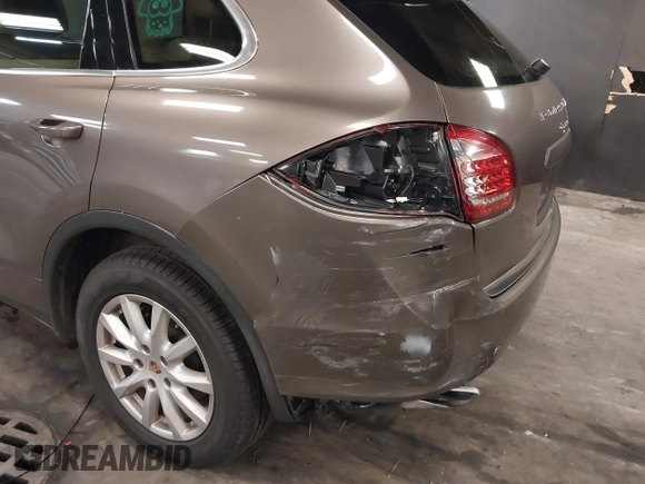 2014 Porsche Cayenne with VIN WP1AA2A26ELA93026, listed as a IAAI auction lot 42272409 with 58,951 mi miles and . Bid and sale history available at DreamBid. Image 6.