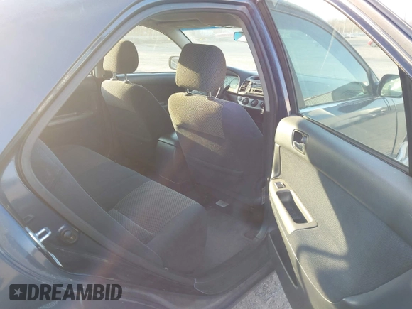 2003 Toyota Camry LE with VIN 4T1BE32K03U241866, listed as a IAAI auction lot 41778603 with 181,603 mi miles and . Bid and sale history available at DreamBid. Image 8.