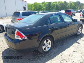 2007 Ford Fusion SE with VIN 3FAHP07157R142485, listed as a IAAI auction lot 42050207 with 150,263 mi miles. Bid and sale history available at carsss.com. Image 4.