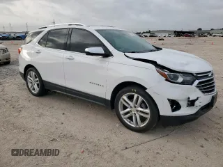 2020 Chevrolet Equinox Premier z VIN 2GNAXNEVXL6226096, wystawiony jako Copart lot #56744635 z przebiegiem 33 594 mil mil oraz Szkoda całkowita • Salvage title. Historia ofert i sprzedaży dostępna na DreamBid. Obrazek 4.
