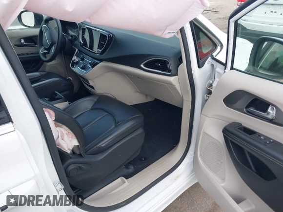 2023 Chrysler Pacifica Touring L with VIN 2C4RC1BG8PR535446, listed as a IAAI auction lot 42307923 with 65,718 mi miles and . Bid and sale history available at DreamBid. Image 5.