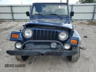 2002 Jeep Wrangler Sport with VIN 1J4FA49S72P722606, listed as a Copart auction lot 72525484 with 104,391 mi miles and Salvage Title. Bid and sale history available at carsss.com. Image 5.