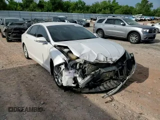 2014 Lincoln MKZ z VIN 3LN6L2G90ER820731, wystawiony jako Copart lot #57818185 z przebiegiem 133 133 mil mil oraz Szkoda całkowita • Salvage title. Historia ofert i sprzedaży dostępna na DreamBid. Obrazek 14.