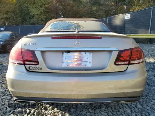 2016 Mercedes-Benz E 400 with VIN WDDKK6FF8GF334288, listed as a Copart auction lot 77405814 with 115,728 mi miles and Salvage Title. Bid and sale history available at carsss.com. Image 6.