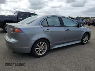 2016 Mitsubishi Lancer SE with VIN JA32V2FW0GU003080, listed as a Copart auction lot 71463814 with 151,595 mi miles and Salvage Title. Bid and sale history available at DreamBid. Image 3.