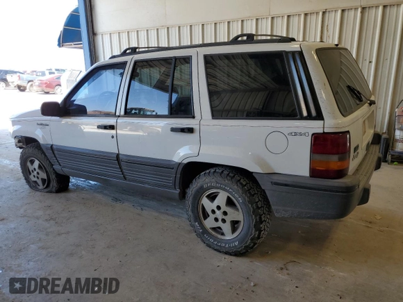 1995 Jeep Grand Cherokee Laredo with VIN 1J4GZ58Y0SC572757, listed as a Copart auction lot 52733375 with 160,588 mi miles and Salvage Title. Bid and sale history available at carsss.com. Image 2.