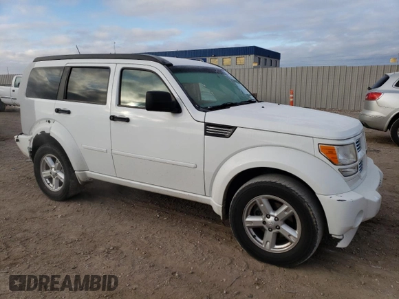 2011 Dodge Nitro SXT with VIN 1D4PU5GK5BW568240, listed as a Copart auction lot 84461784 with 101,246 mi miles and Salvage Title. Bid and sale history available at DreamBid. Image 4.