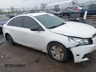 2014 Chevrolet Cruze LS with VIN 1G1PA5SH0E7145168, listed as a IAAI auction lot 41957410 with 151,422 mi miles and . Bid and sale history available at DreamBid. Image 14.