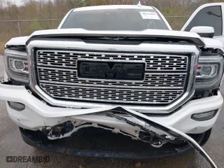 2018 GMC Sierra 1500 Denali with VIN 3GTU2PEJ4JG280332, listed as a IAAI auction lot 41784645 with 119,815 mi miles. Bid and sale history available at carsss.com. Image 10.