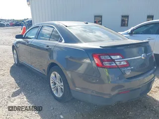 2015 Ford Taurus SEL with VIN 1FAHP2E87FG156969, listed as a IAAI auction lot 42506157 with 99,184 mi miles and . Bid and sale history available at DreamBid. Image 3.