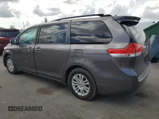 2013 Toyota Sienna XLE AAS with VIN 5TDYK3DC7DS389872, listed as a Copart auction lot 66072995 with 95,797 mi miles and Clean title. Bid and sale history available at DreamBid. Image 2.