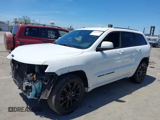 2018 Jeep Grand Cherokee Altitude with VIN 1C4RJEAG2JC404009, listed as a IAAI auction lot 42691304 with 60,948 mi miles and . Bid and sale history available at DreamBid. Image 18.