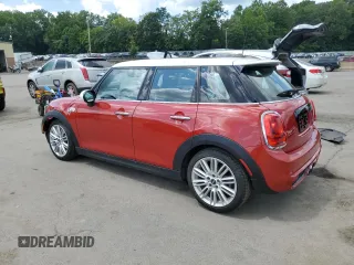 2016 MINI Hardtop 4 Door S with VIN WMWXU3C57G2D28848, listed as a Copart auction lot 66030565 with 34,448 mi miles and Salvage title. Bid and sale history available at DreamBid. Image 2.