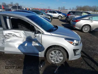 2023 Kia Rio LX with VIN 3KPA24ADXPE606463, listed as a IAAI auction lot 41728523 with 8,909 mi miles and . Bid and sale history available at DreamBid. Image 6.