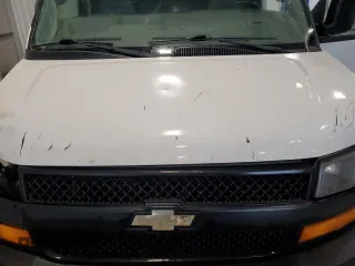 2019 Chevrolet Express Cargo z VIN 1GCWGBFG2K1277946, wystawiony jako Copart lot #60071425 z przebiegiem 188 599 mil mil oraz Szkoda całkowita • Salvage title. Historia ofert i sprzedaży dostępna na DreamBid. Obrazek 12.