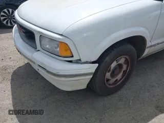 1997 GMC Sonoma z VIN 1GTCS1443VK511286, wystawiony jako IAAI lot #42236026 z przebiegiem 154 768 mil mil oraz . Historia ofert i sprzedaży dostępna na DreamBid. Obrazek 6.