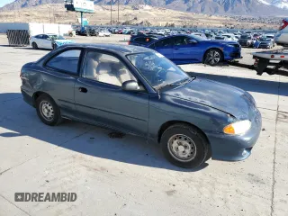 1999 Hyundai Accent z VIN KMHVD14N3XU456921, wystawiony jako Copart lot #44805175 z przebiegiem 112 134 mil mil oraz Tytuł czysty. Historia ofert i sprzedaży dostępna na DreamBid. Obrazek 4.