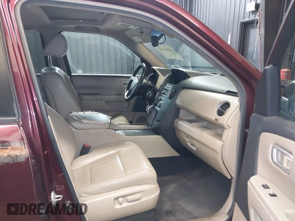 2012 Honda Pilot EX-L with VIN 5FNYF4H55CB018315, listed as a IAAI auction lot 42051230 with 121,702 mi miles and . Bid and sale history available at DreamBid. Image 5.