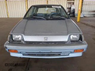 1984 Honda Civic z VIN JHMAH3321ES036981, wystawiony jako Copart lot #55697265 z przebiegiem Nie podano mil oraz Tytuł czysty. Historia ofert i sprzedaży dostępna na DreamBid. Obrazek 5.