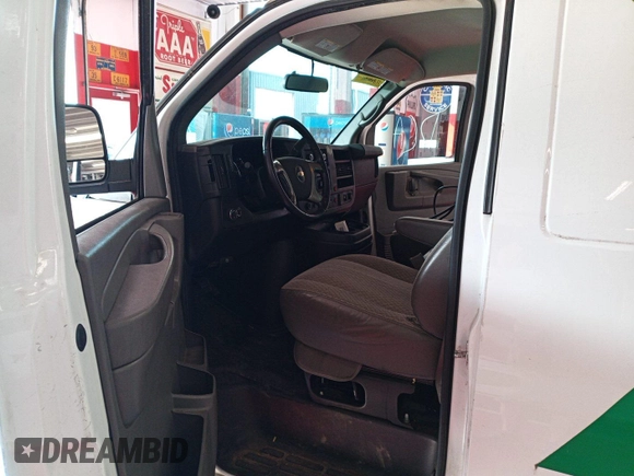 2015 Chevrolet Express Cargo with VIN 1GCWGFCF1F1160108, listed as a IAAI auction lot 42727390 with 123,035 mi miles and . Bid and sale history available at DreamBid. Image 7.
