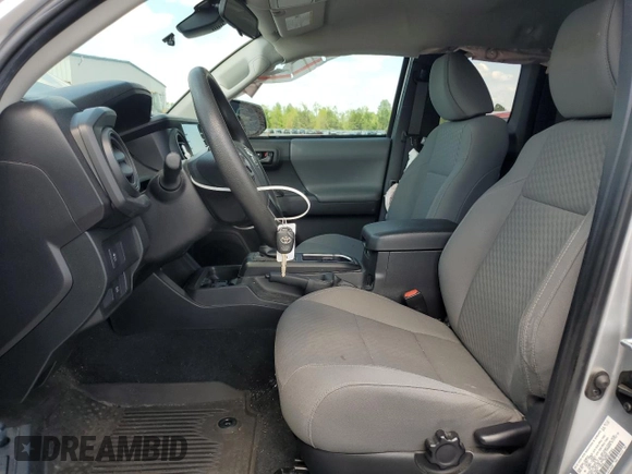 2023 Toyota Tacoma SR with VIN 3TYSX5ENXPT018099, listed as a Copart auction lot 52520145 with 15,640 mi miles and Salvage title. Bid and sale history available at DreamBid. Image 7.
