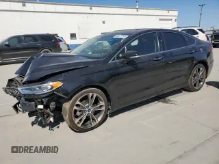 2020 Ford Fusion Titanium with VIN 3FA6P0D9XLR136564, listed as a Copart auction lot 59977715 with Not provided miles and Salvage title. Bid and sale history available at DreamBid. Image 1.
