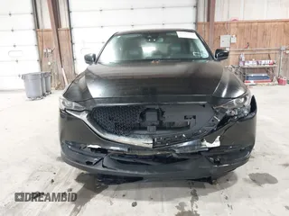 2017 Mazda CX-5 Grand Touring with VIN JM3KFBDL6H0143013, listed as a IAAI auction lot 41912979 with 122,890 mi miles. Bid and sale history available at carsss.com. Image 6.
