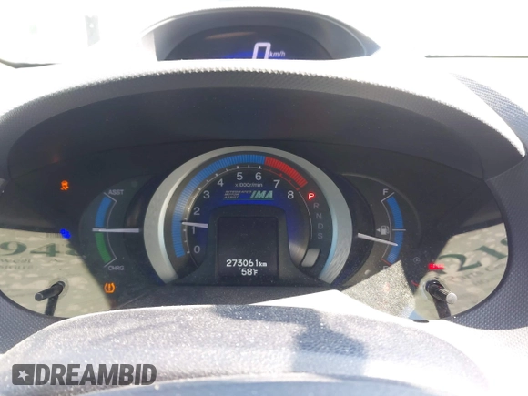 2010 Honda Insight EX with VIN JHMZE2H78AS016537, listed as a IAAI auction lot 42199484 with 273,061 mi miles and . Bid and sale history available at DreamBid. Image 7.