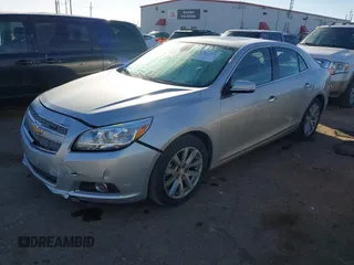 2013 Chevrolet Malibu LTZ with VIN 1G11H5SA7DU138464, listed as a IAAI auction lot 41517379 with 116,430 mi miles and . Bid and sale history available at DreamBid. Image 17.