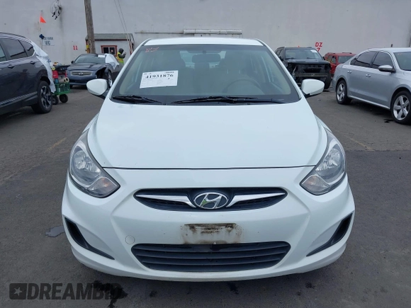 2013 Hyundai Accent GLS with VIN KMHCT4AE6DU291877, listed as a IAAI auction lot 41931876 with 136,781 mi miles. Bid and sale history available at carsss.com. Image 12.