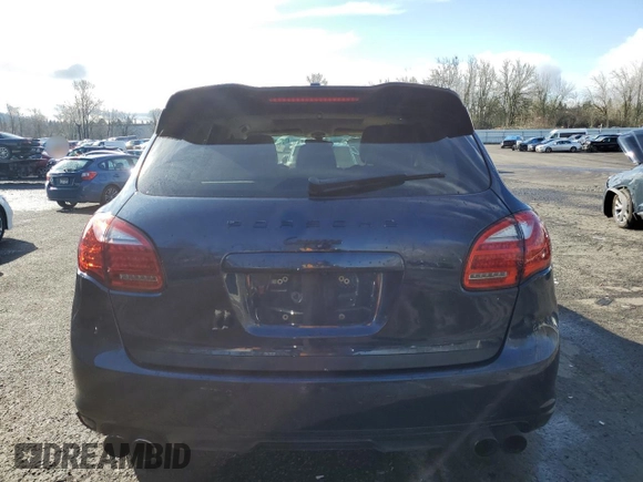 2012 Porsche Cayenne with VIN WP1AA2A20CLA02006, listed as a Copart auction lot 49129885 with 143,605 mi miles and Salvage title. Bid and sale history available at DreamBid. Image 6.