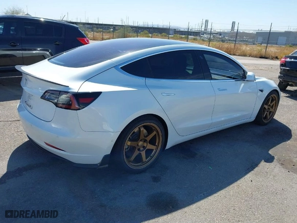 2018 Tesla Model 3 Long Range Battery with VIN 5YJ3E1EA1JF035459, listed as a IAAI auction lot 41746206 with 95,972 mi miles. Bid and sale history available at carsss.com. Image 4.