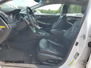 2012 Hyundai Sonata Limited z VIN 5NPEC4AB2CH490212, wystawiony jako Copart lot #59576655 z przebiegiem 144 183 mil mil oraz Szkoda całkowita • Salvage title. Historia ofert i sprzedaży dostępna na DreamBid. Obrazek 7.