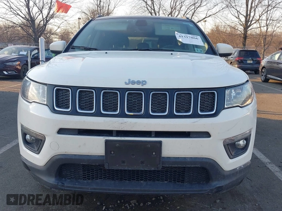 2019 Jeep Compass Latitude with VIN 3C4NJDBB4KT714079, listed as a IAAI auction lot 41317866 with 76,601 mi miles and . Bid and sale history available at DreamBid. Image 11.