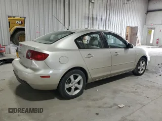 2005 Mazda 3 i with VIN JM1BK12F251297428, listed as a Copart auction lot 53041355 with 202,887 mi miles and Salvage Title. Bid and sale history available at DreamBid. Image 3.