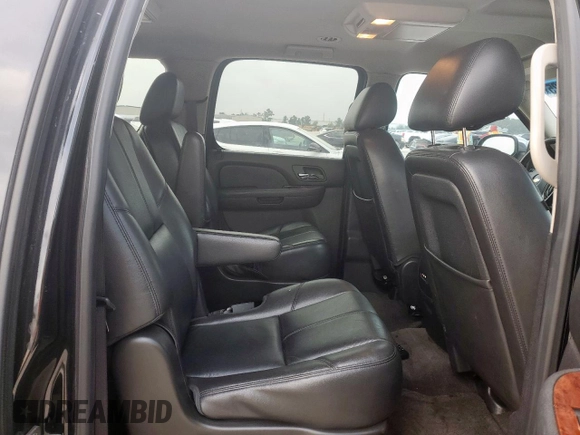 2012 Chevrolet Suburban LT with VIN 1GNSCJE01CR325049, listed as a Copart auction lot 56212525 with 264,000 mi miles and Clean title. Bid and sale history available at DreamBid. Image 11.