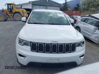 2018 Jeep Grand Cherokee Laredo z VIN 1C4RJFAG1JC479838, wystawiony jako IAAI lot #41903955 z przebiegiem 73 076 mil mil oraz . Historia ofert i sprzedaży dostępna na DreamBid. Obrazek 12.