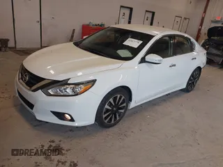 2018 Nissan Altima SR with VIN 1N4AL3AP7JC239057, listed as a IAAI auction lot 41817778 with 93,076 mi miles and . Bid and sale history available at carsss.com. Image 2.