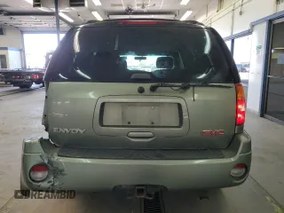2004 GMC Envoy SLE with VIN 1GKDS13S442417232, listed as a Copart auction lot 51821225 with 242,945 mi miles and Salvage Title. Bid and sale history available at carsss.com. Image 6.