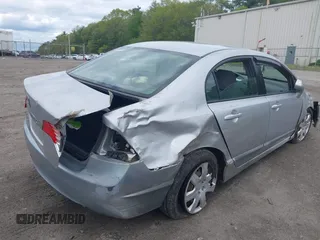 2010 Honda Civic LX with VIN 2HGFA1F59AH323381, listed as a IAAI auction lot 42181040 with 320,419 mi miles and . Bid and sale history available at DreamBid. Image 4.