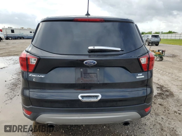 2019 Ford Escape SE z VIN 1FMCU0GD9KUA17378, wystawiony jako Copart lot #54778325 z przebiegiem 156 206 mil mil oraz Szkoda całkowita • Salvage title. Historia ofert i sprzedaży dostępna na DreamBid. Obrazek 6.